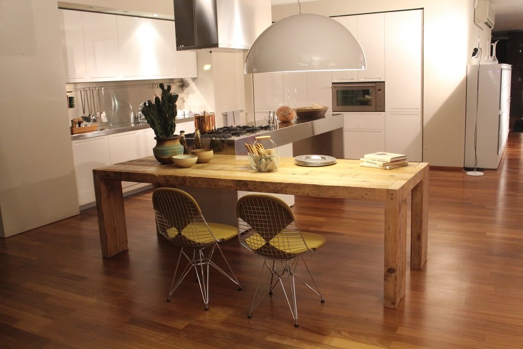 Renovated kitchen with a wooden table